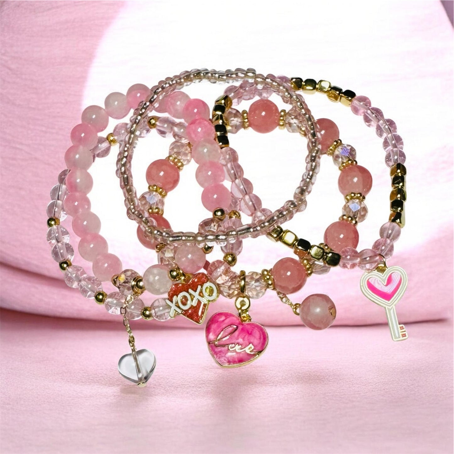 5 PIECE PINK & GOLD BRACELET SET